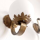 Pair of brutalist wall sconces in gilded metal from around 1970.