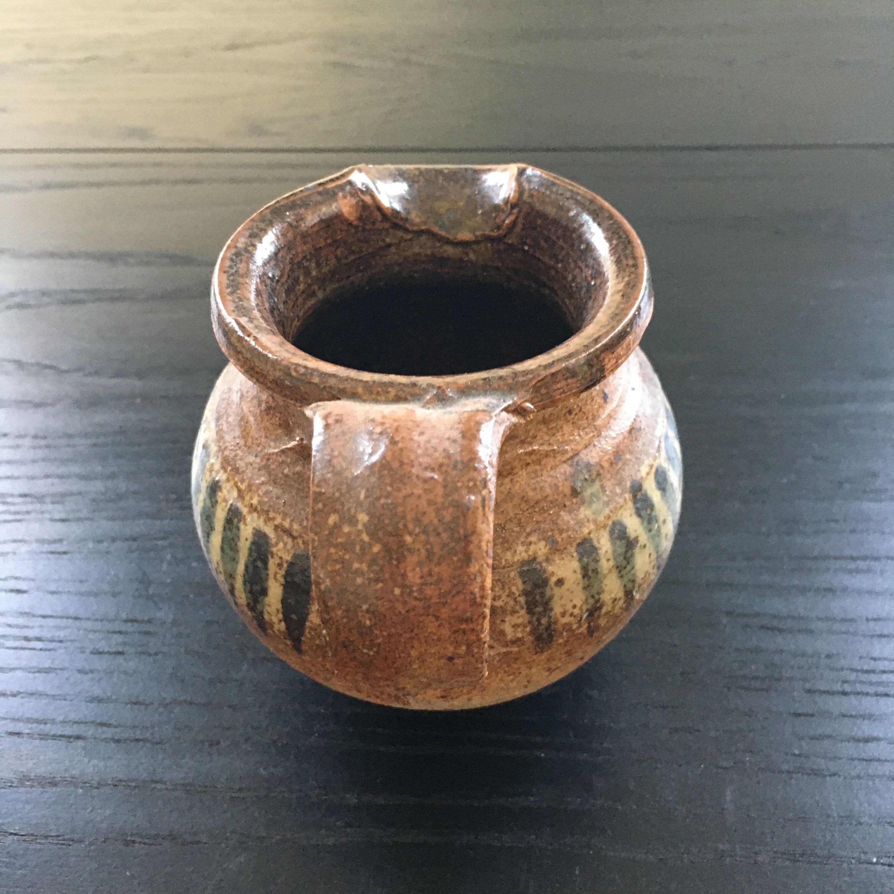 Stoneware pitcher with striped decoration