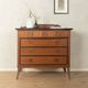 Classic chest of drawers from the 1920s in dark brown