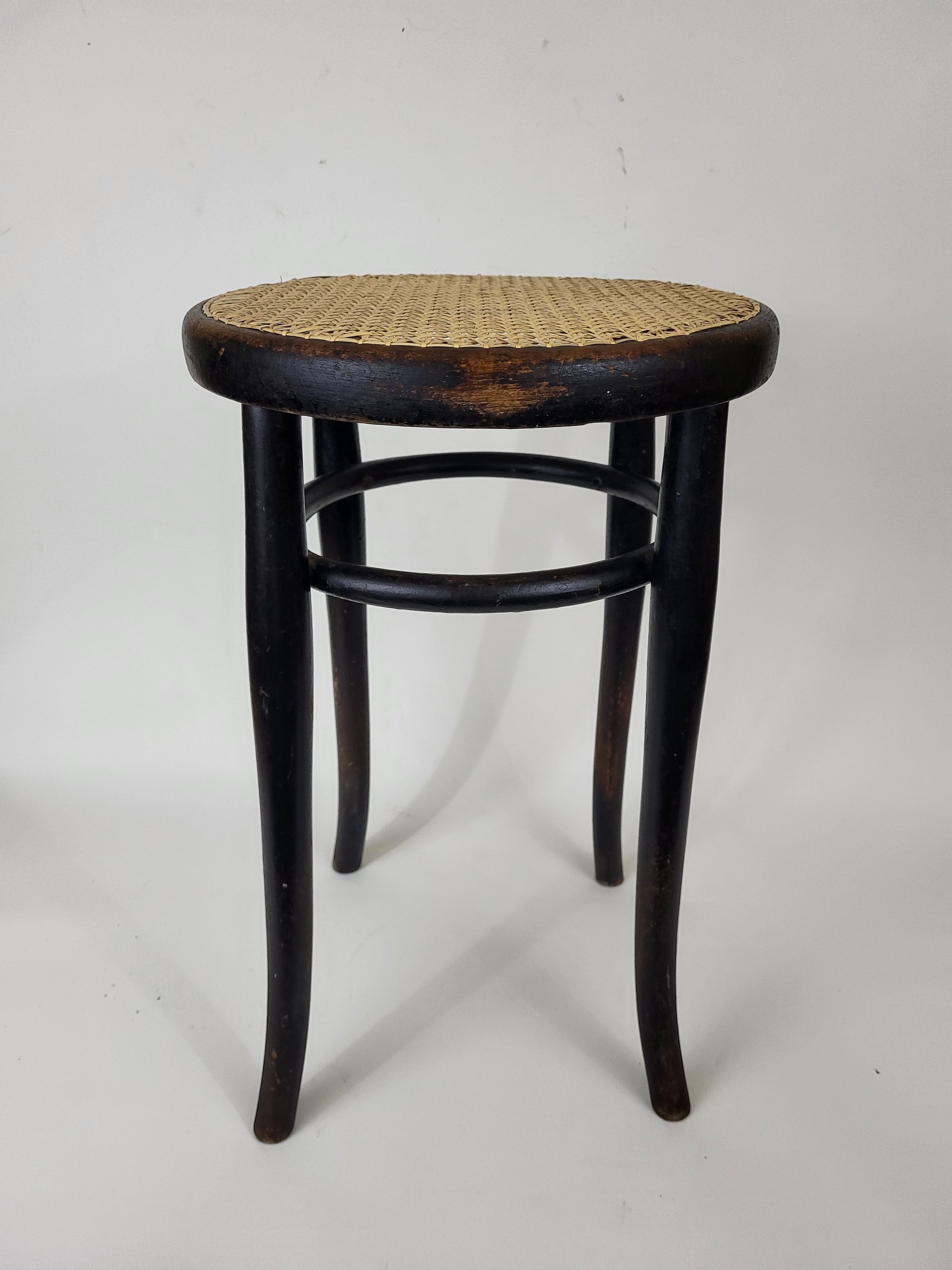 Blackened curved wooden stool Thonet
