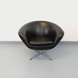 Vintage Scandinavian swivel chair in faux leather and chrome from the 1970s.