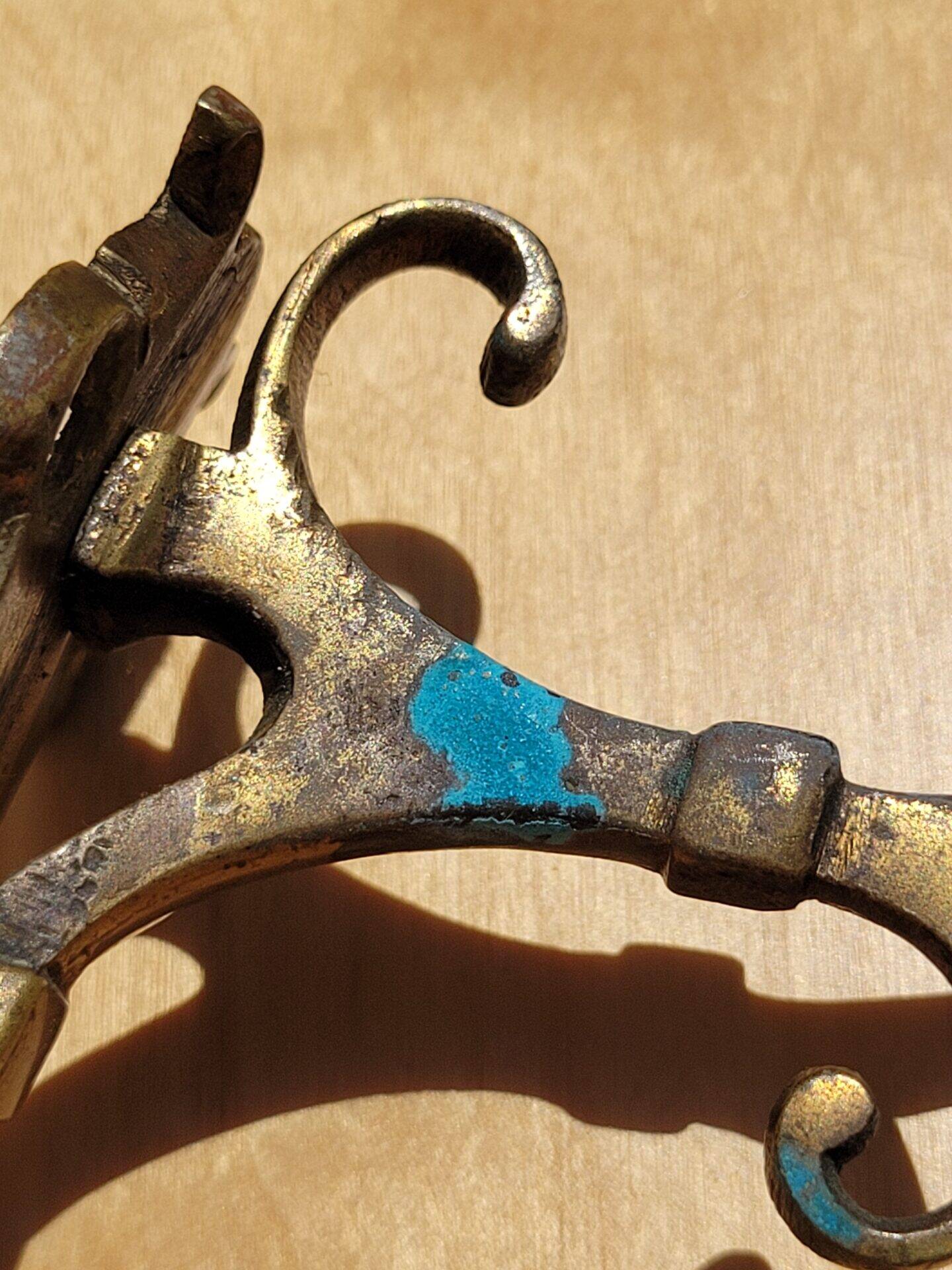 Pair of antique gilt bronze coat hooks