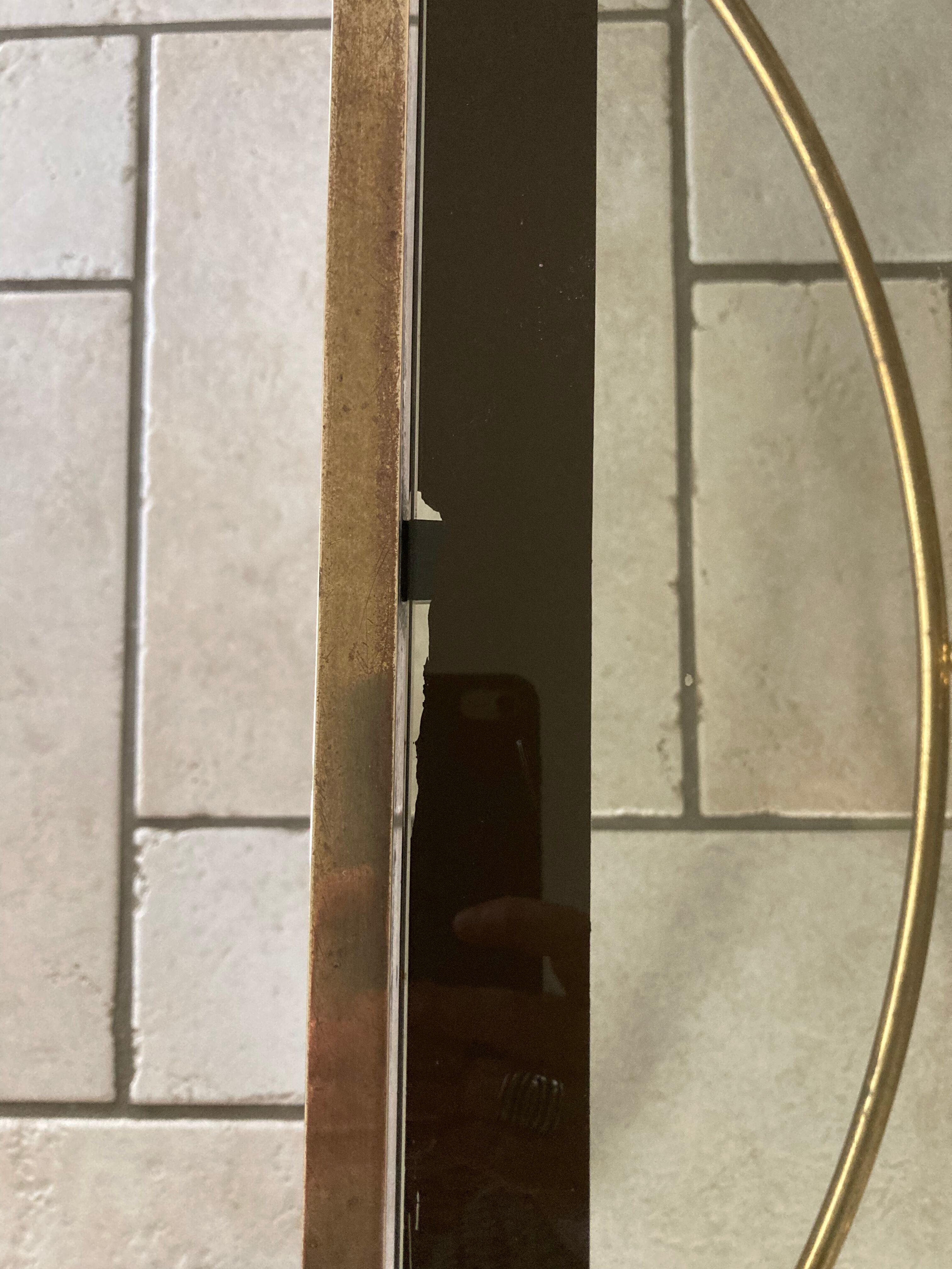 Coffee table in glass and gold metal