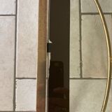 Coffee table in glass and gold metal
