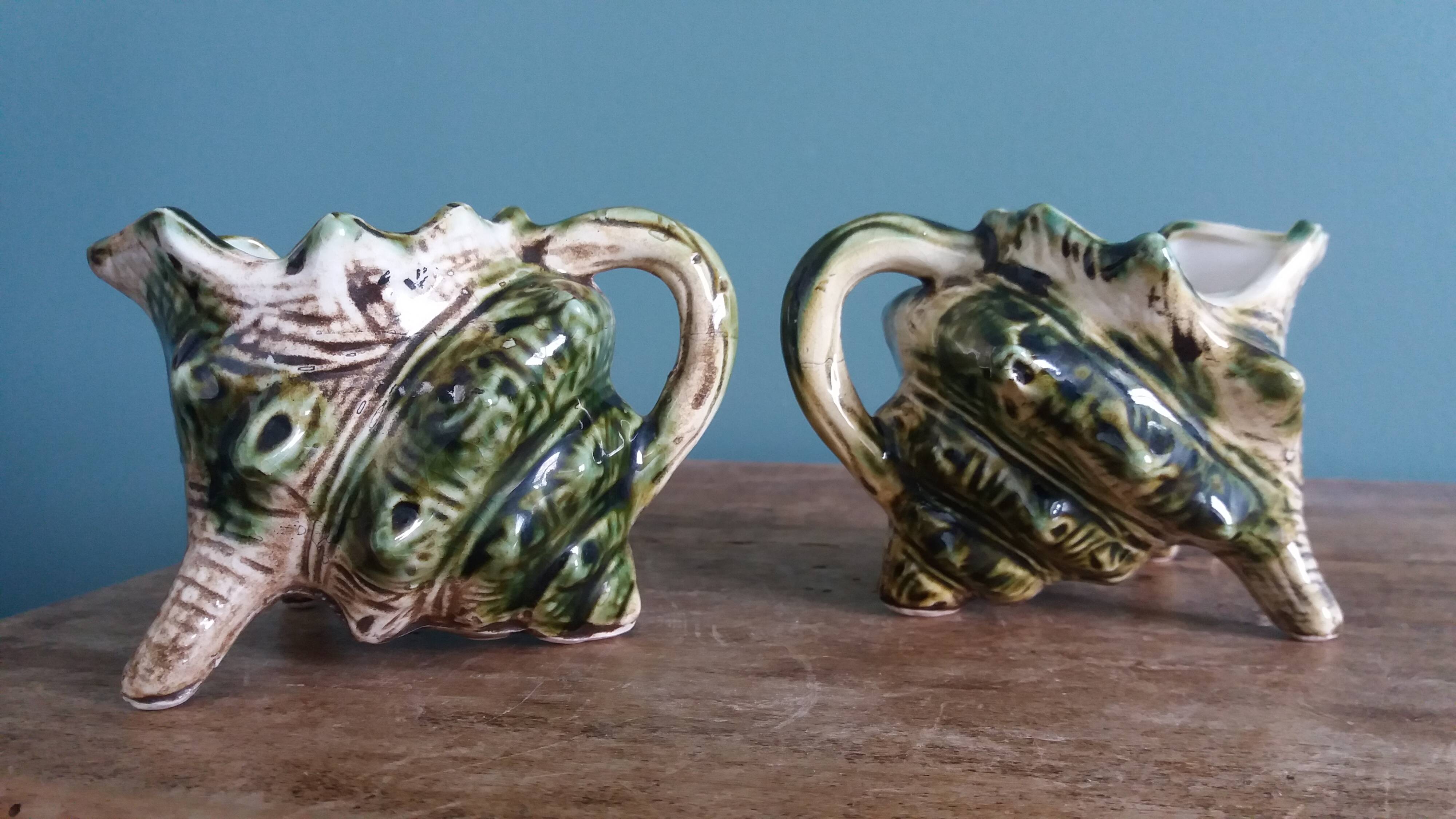 Animal-shaped milk jug shell in slipware.