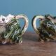 Animal-shaped milk jug shell in slipware.
