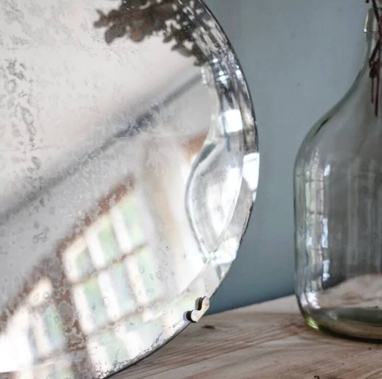 Antique oval bevelled mirror