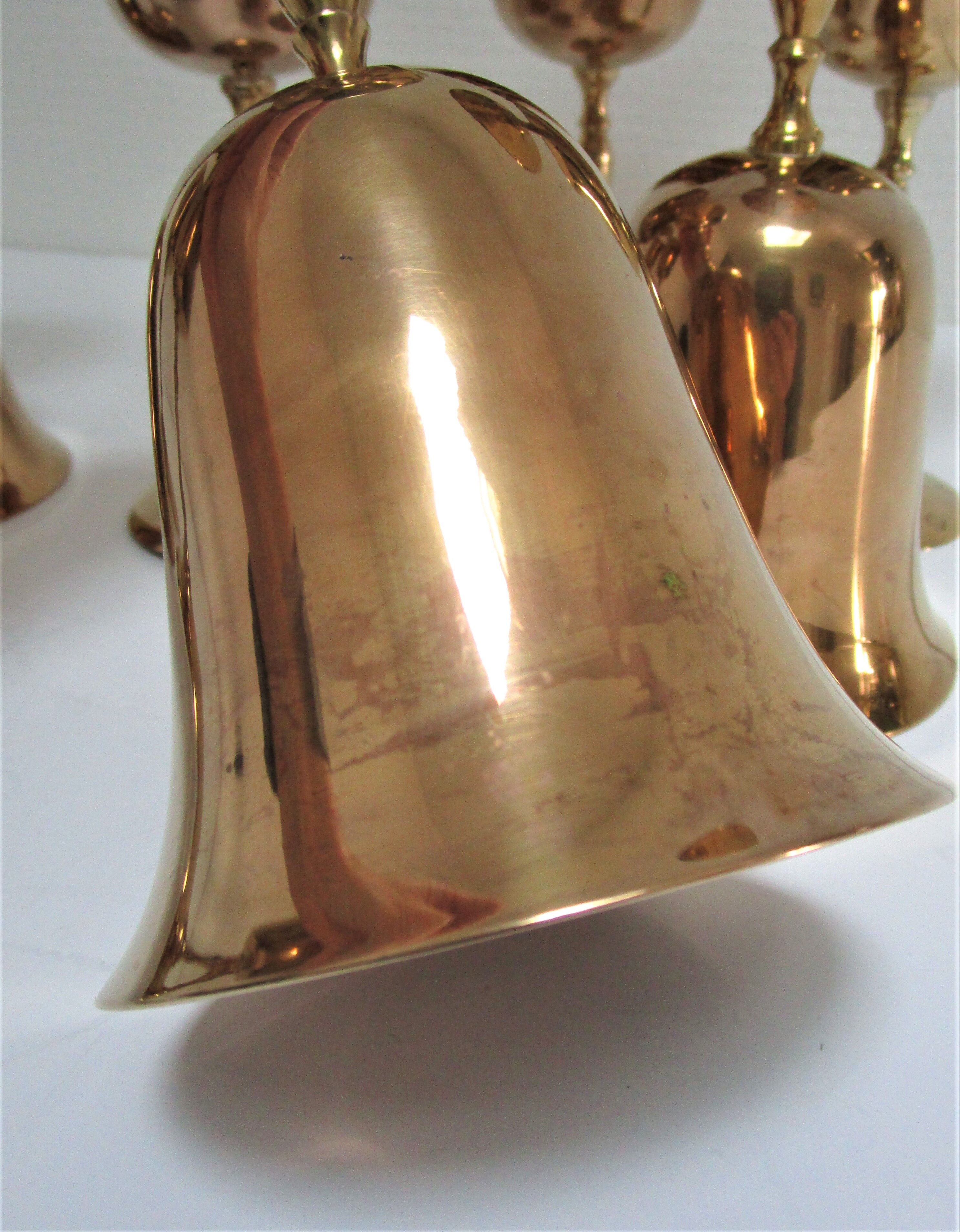 Set of eight vintage solid brass walking glasses