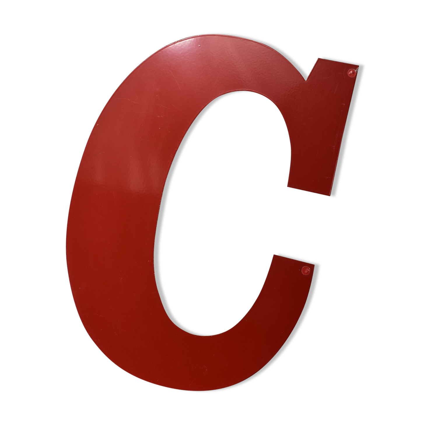 Industrial letter "C" in red metal