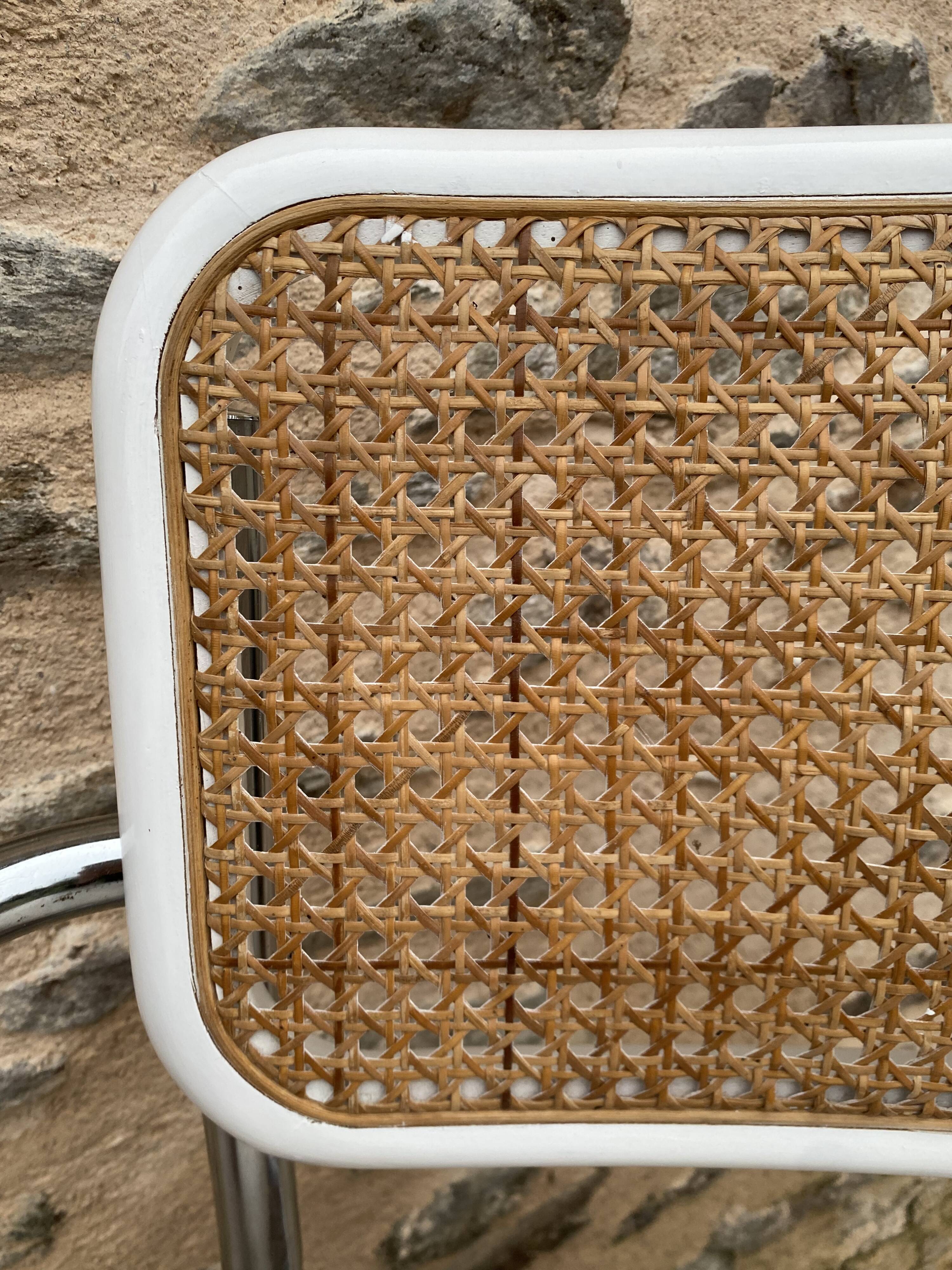 Cantilever armchair in cane and bouclette fabric