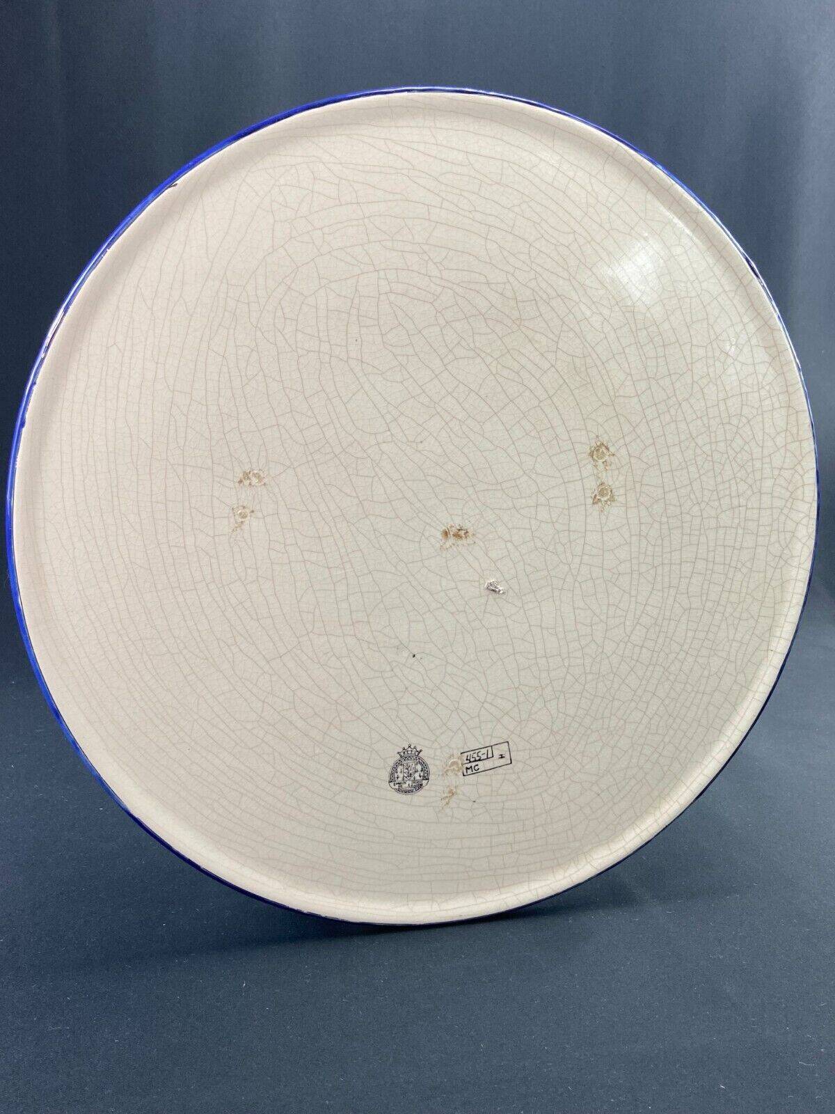 Large circular earthenware dish from Louvière with Longwy style bird decoration