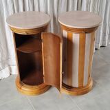 A pair of distressed bedside tables.