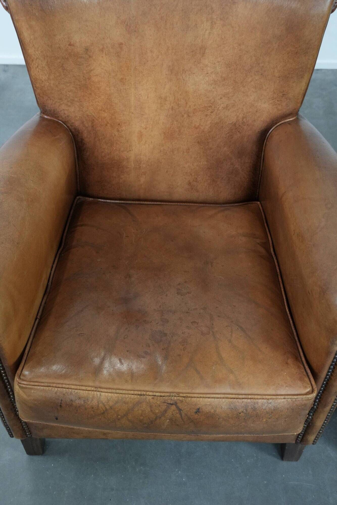 Set of two vintage sheepskin armchairs with beautiful and warm colours