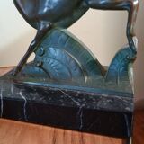 Pair - Chamois metal bookends with green patina & black marble base
