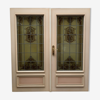 Wooden doors with stained glass