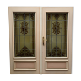 Wooden doors with stained glass