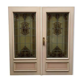 Wooden doors with stained glass