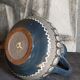 Ceramic handle vase with vintage graphic decoration