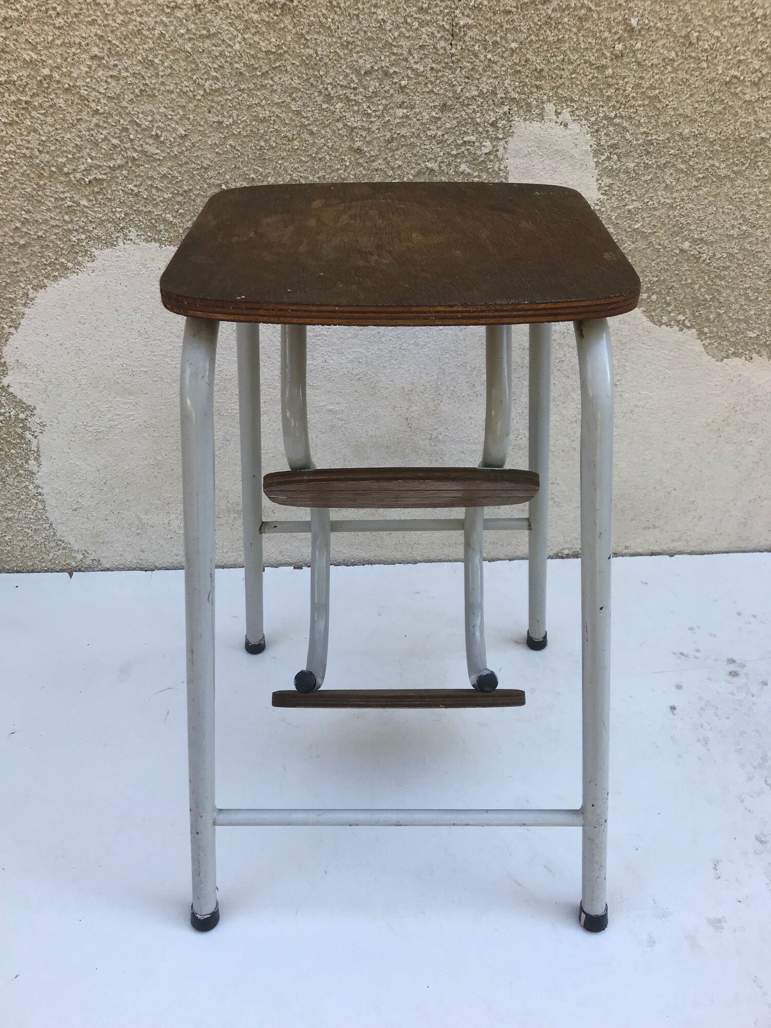 Antique grey metal step ladder