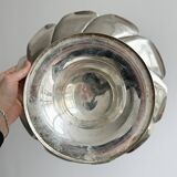 large dish on a shiny metal stand
