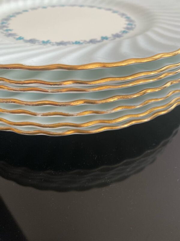 7 assiettes en porcelaine de Chine Minton