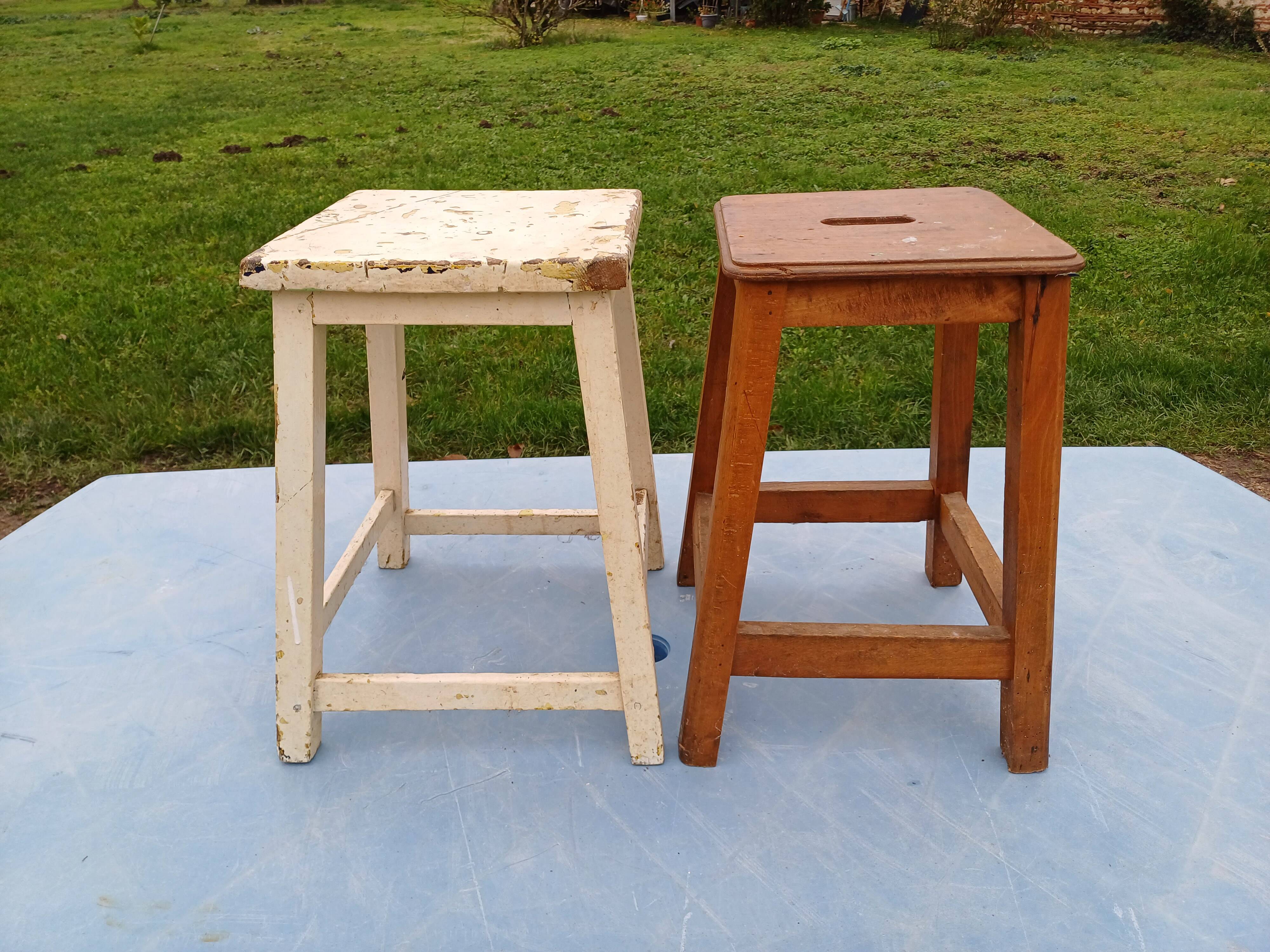 2 wooden workshop stools