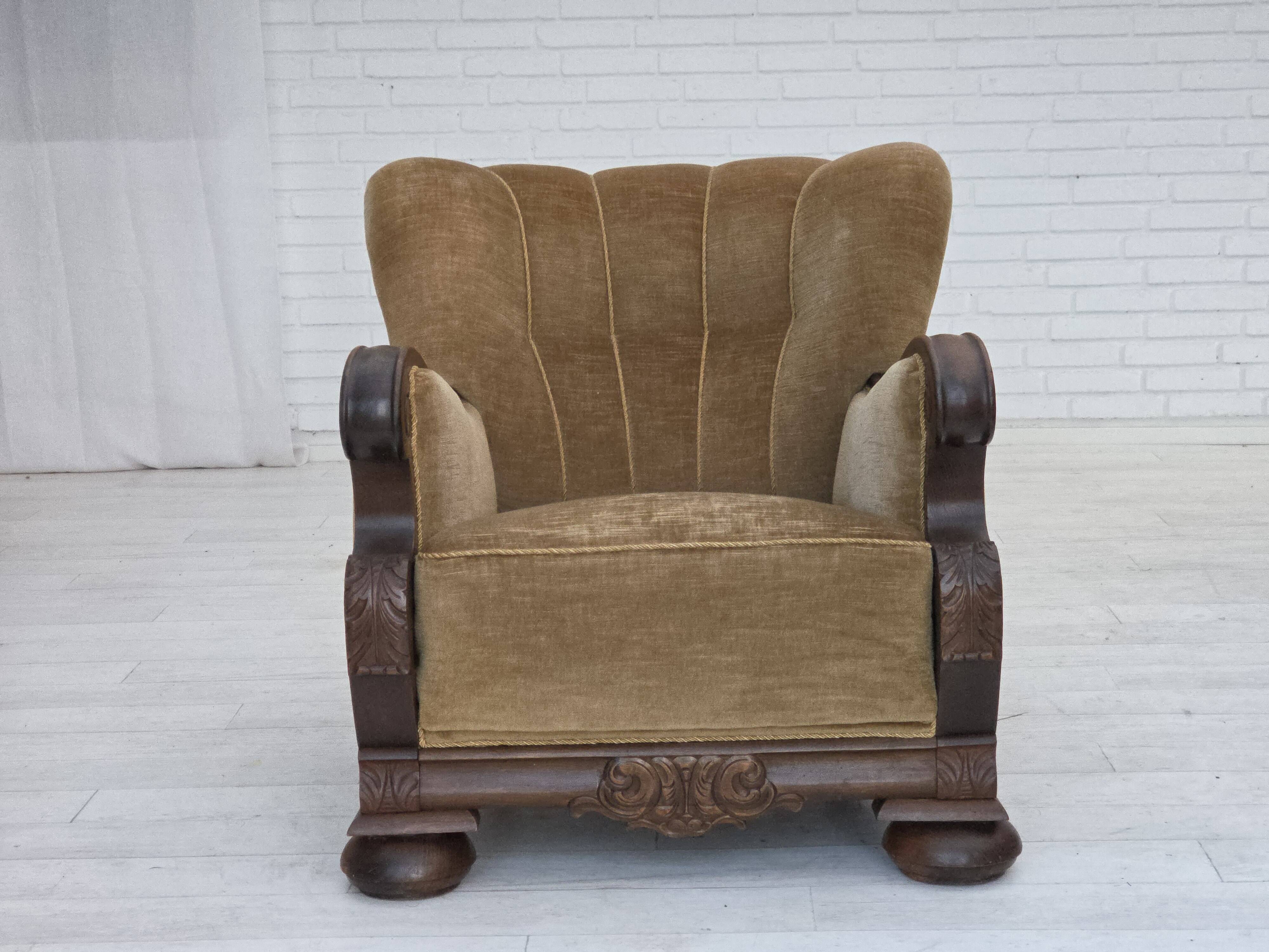 1960s, Danish armchair, original green furniture velour, carved oak wood.