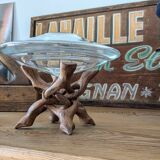 Glass cup molded on carved exotic wood