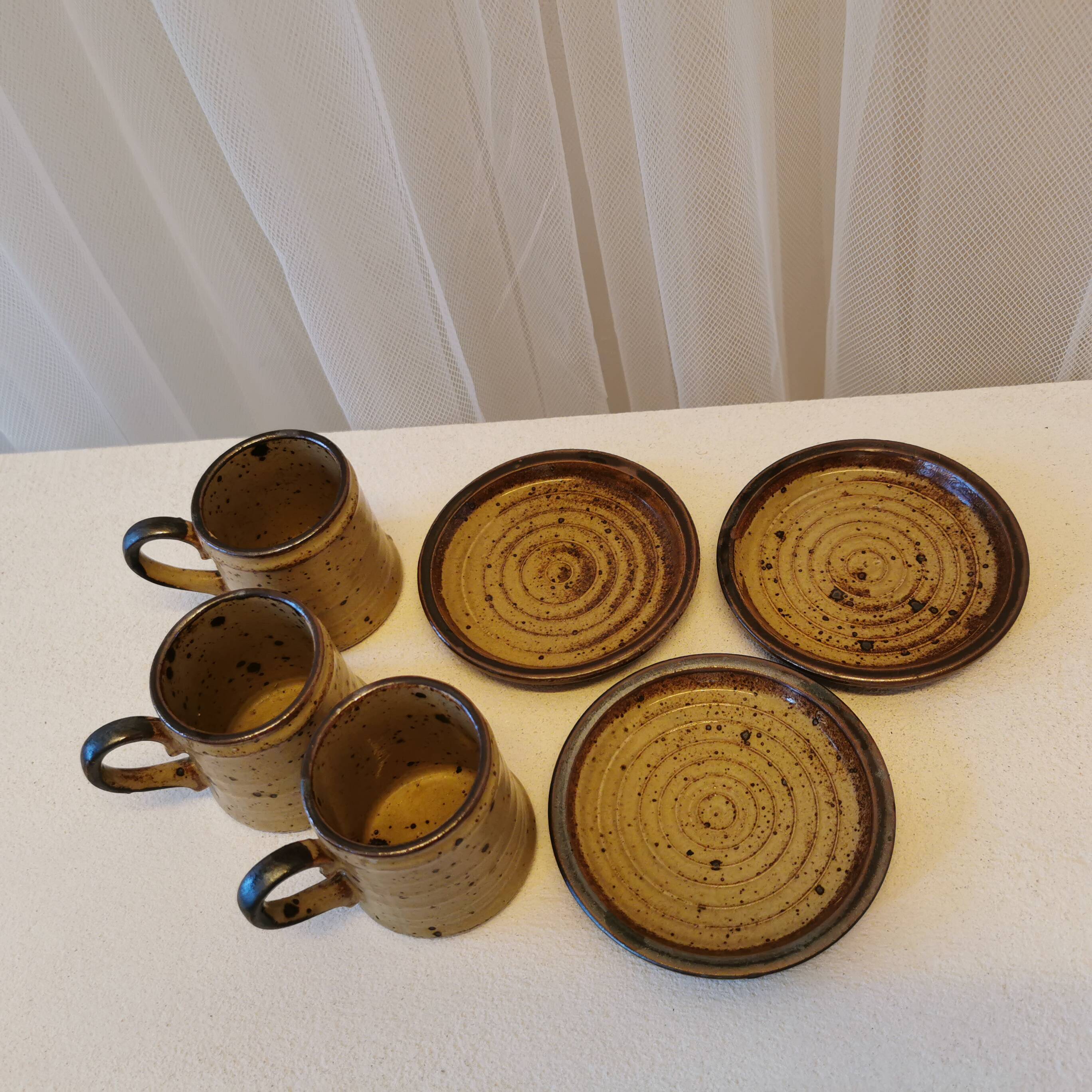 Set of 3 coffee cups and saucers