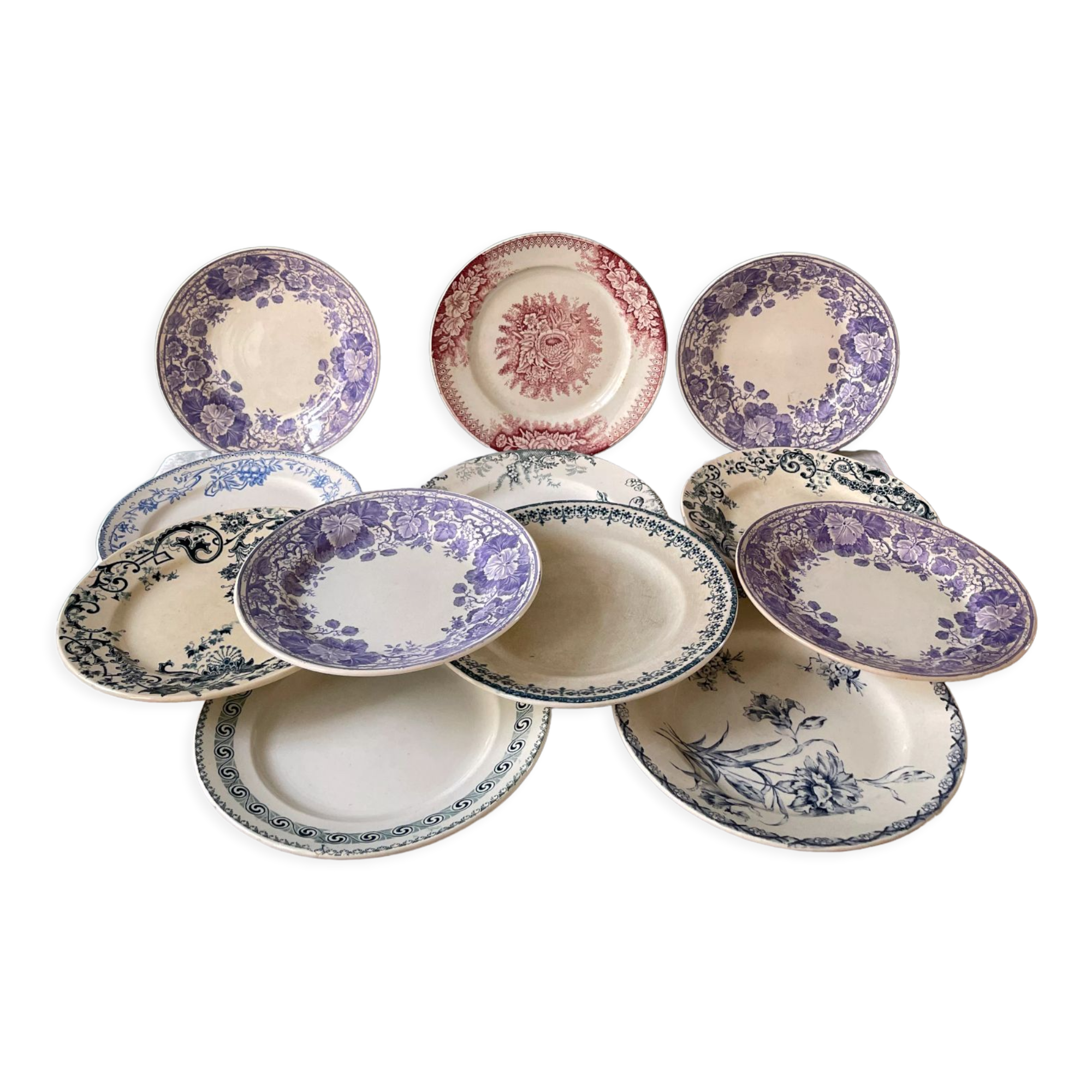 Series of 12 mismatched Terre de Fer dessert plates