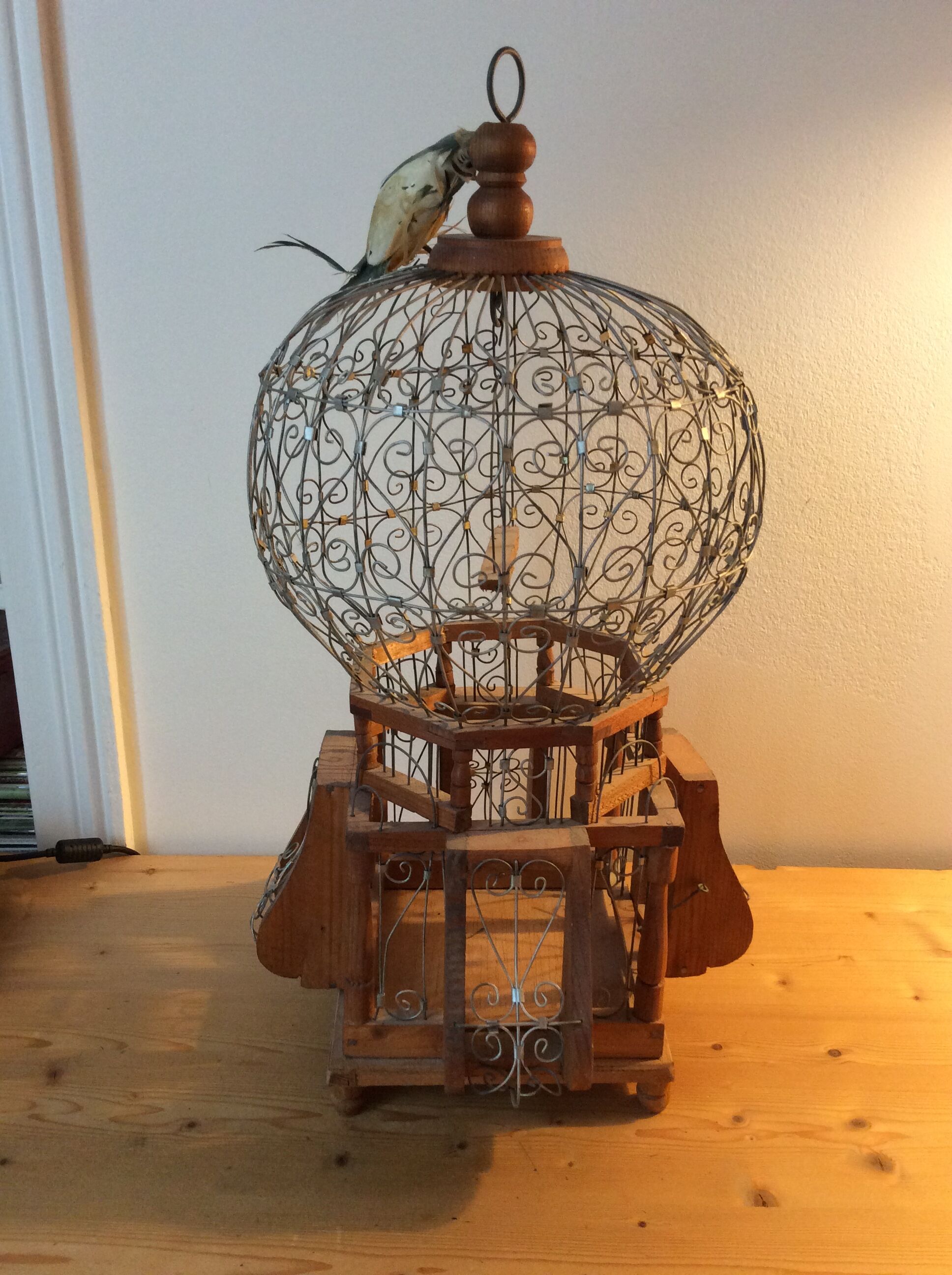 Pretty old bird cage.