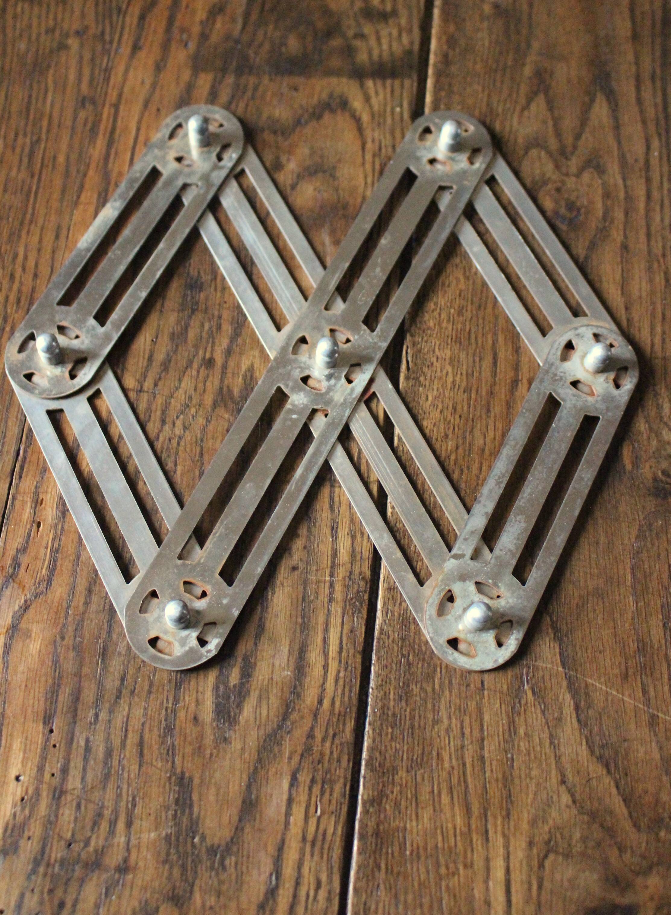 Vintage folding metal trivet