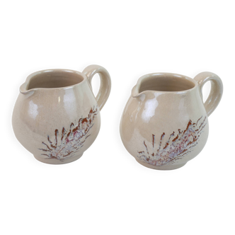 Pair of ceramic milk jugs signed La Roue Vallauris