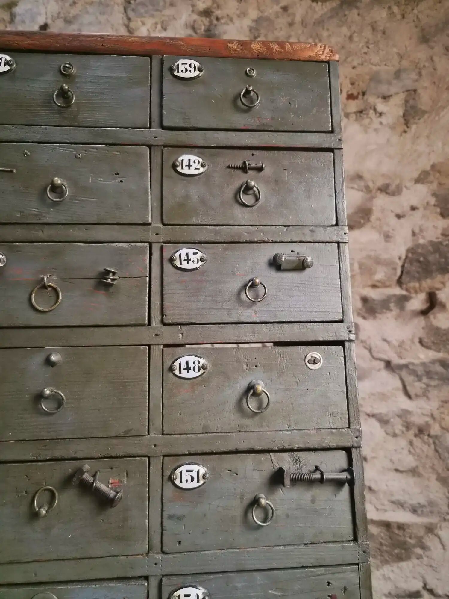 Antique hardware cabinet with 48 drawers, circa 1900.