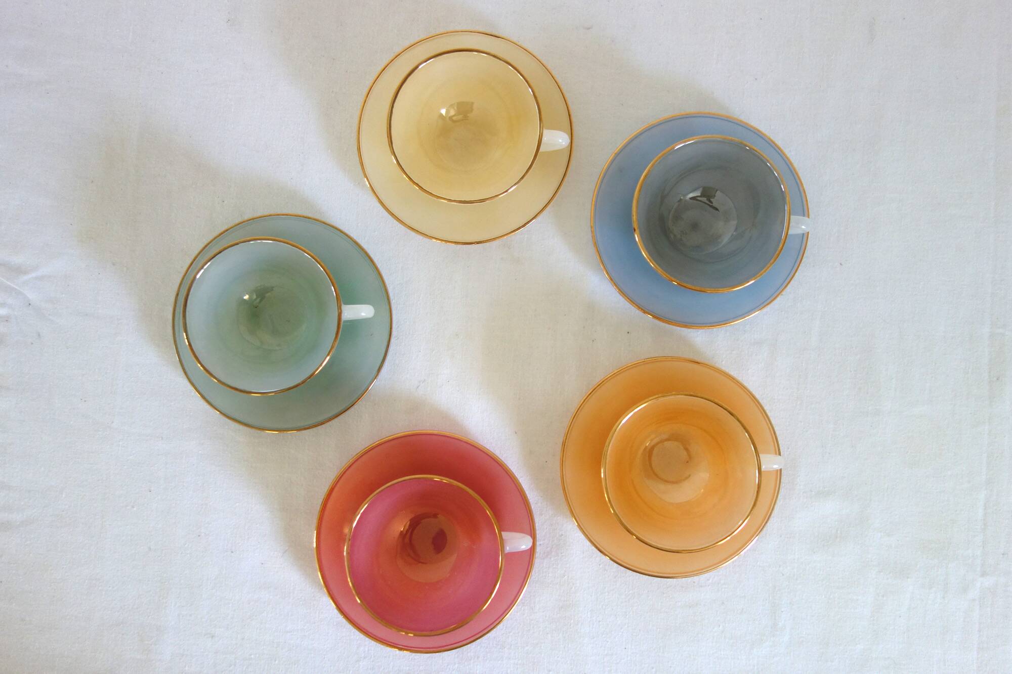 5 vintage Arcopal Harlequin teacups with saucers
