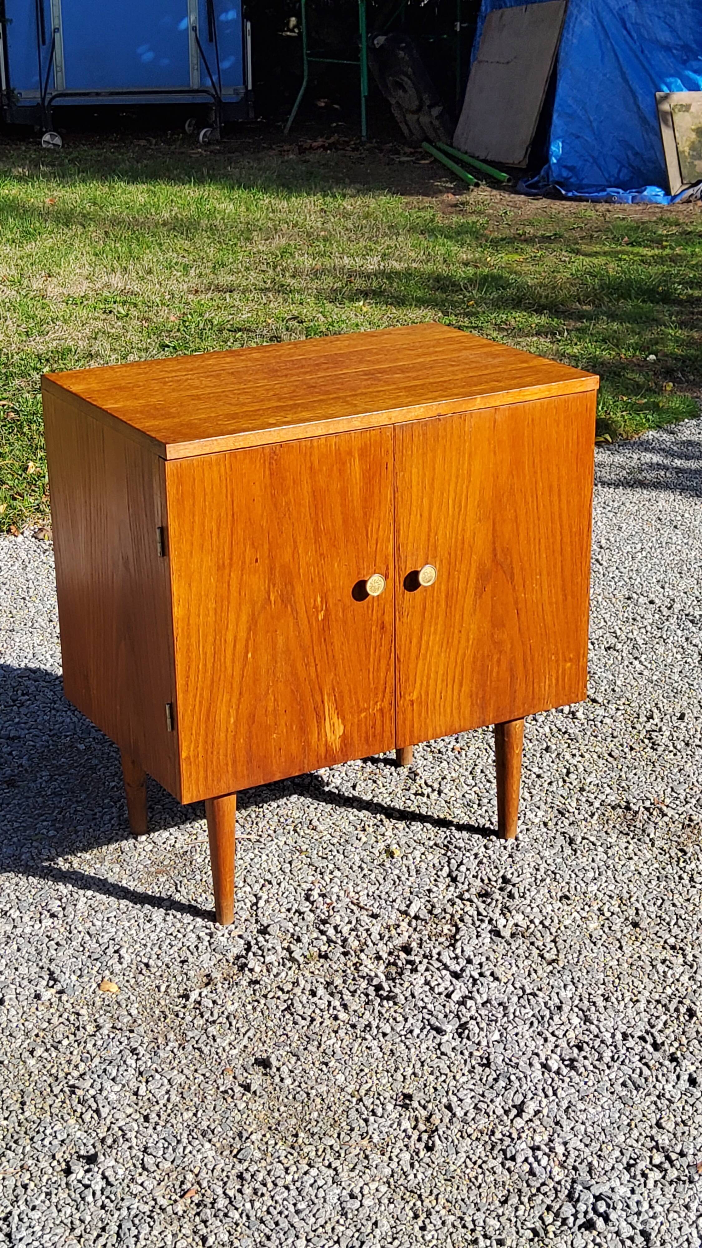 Vintage golden oak sideboard with conical legs from the 1950s