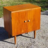 Vintage golden oak sideboard with conical legs from the 1950s