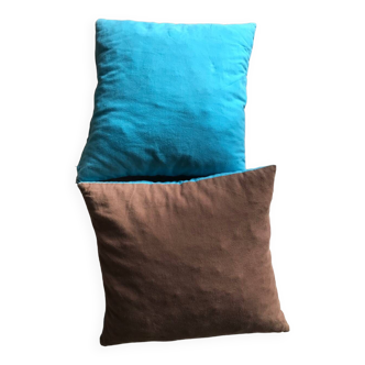 Set of two turquoise blue and brown cushions
