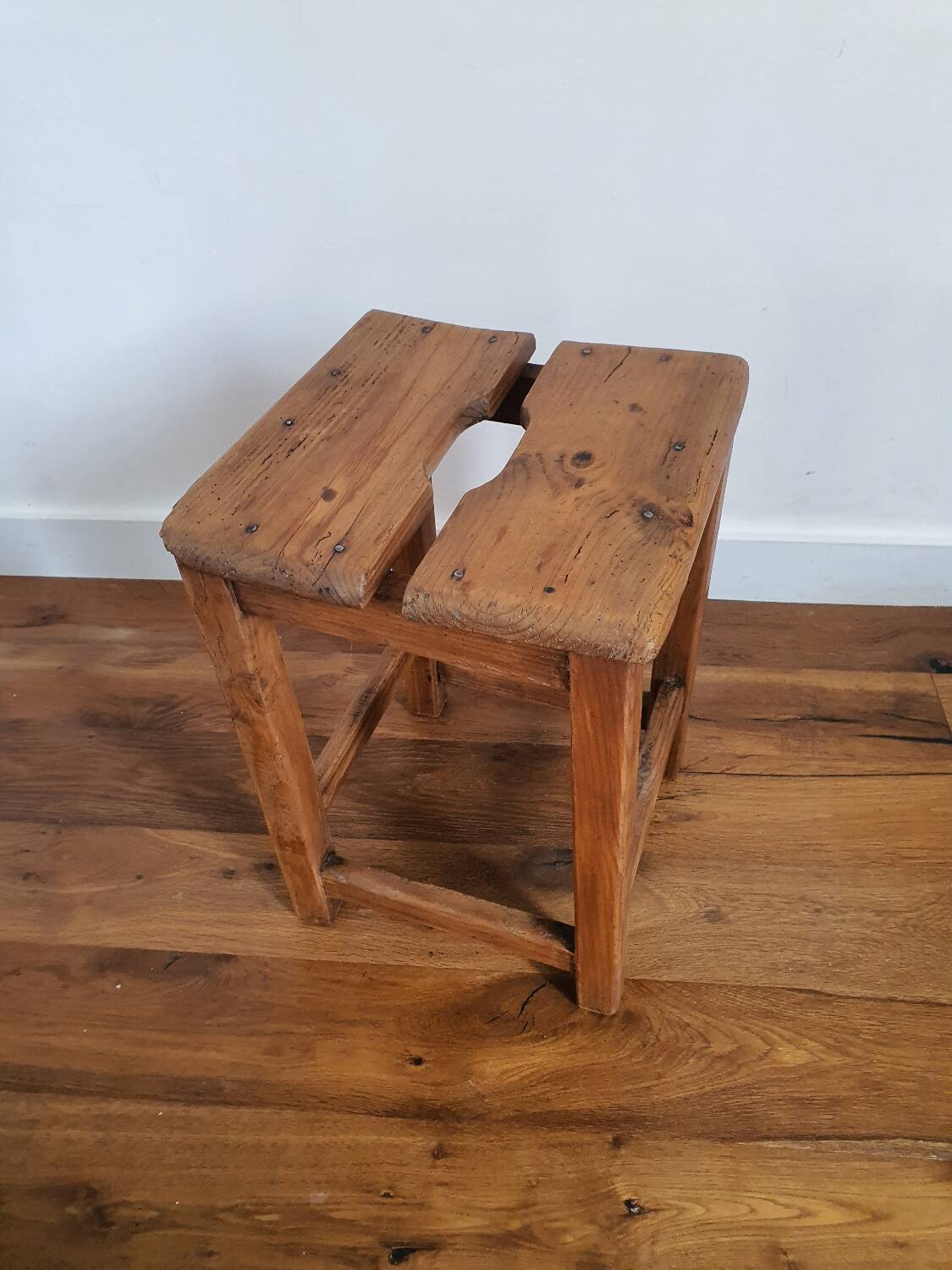 Antique wooden farm stool