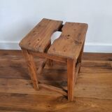 Antique wooden farm stool