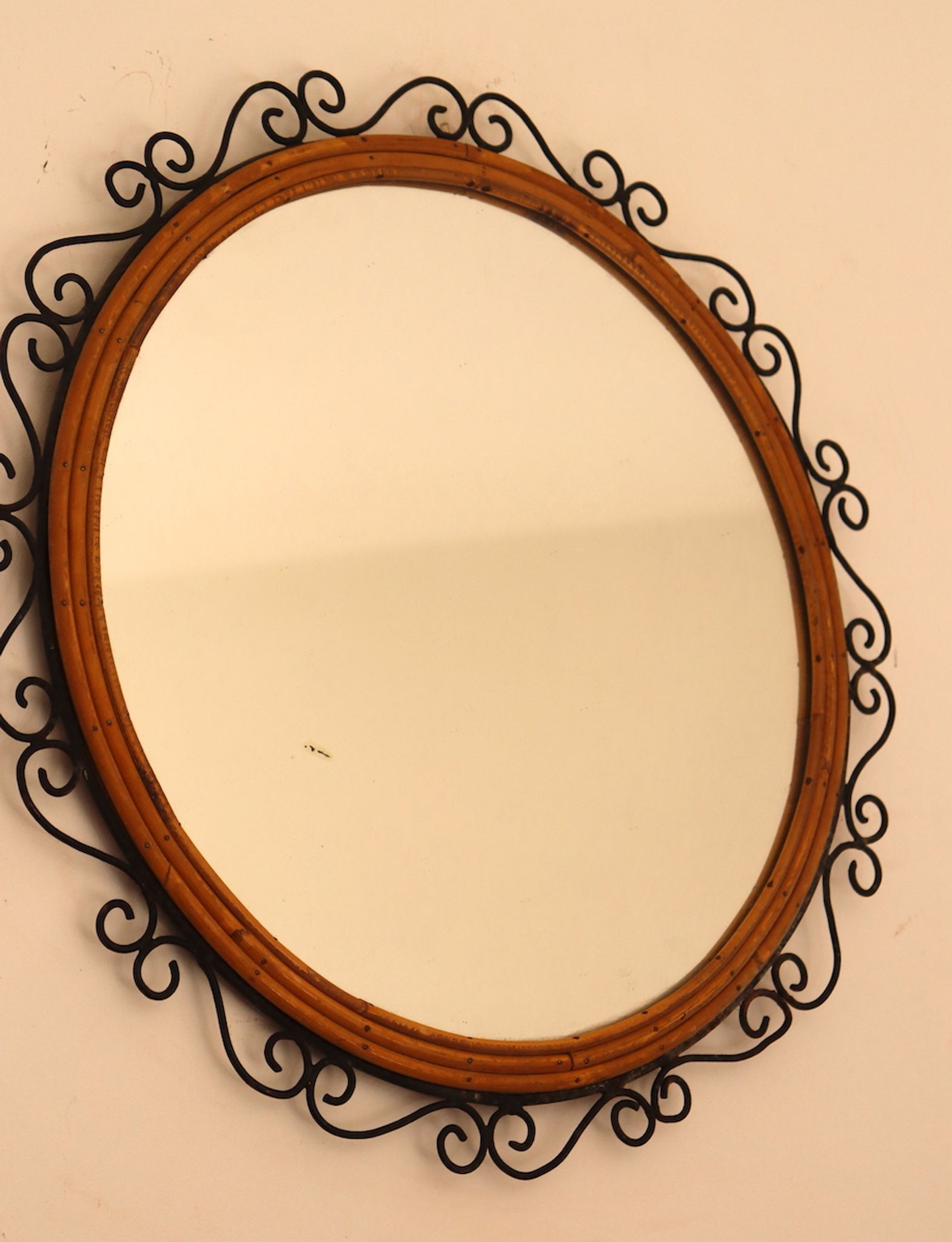 Round iron and rattan mirror