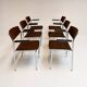 Set of 6 stackable chairs in rust colour by Gijs van der Sluis, 1970s.
