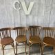 Mismatched curved wood bistro chairs (Fischel..)