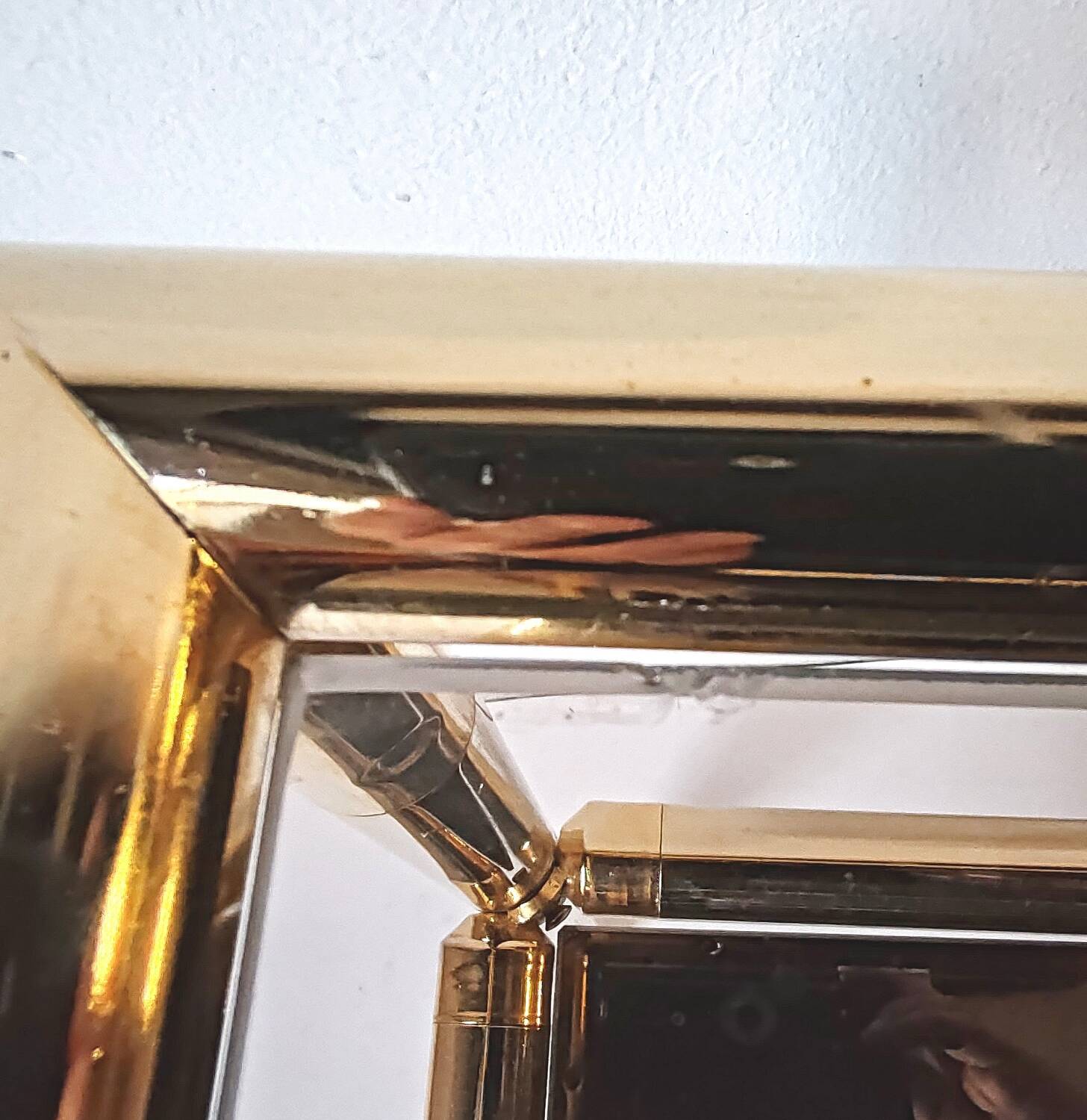 Brass and glass end table from the 70s