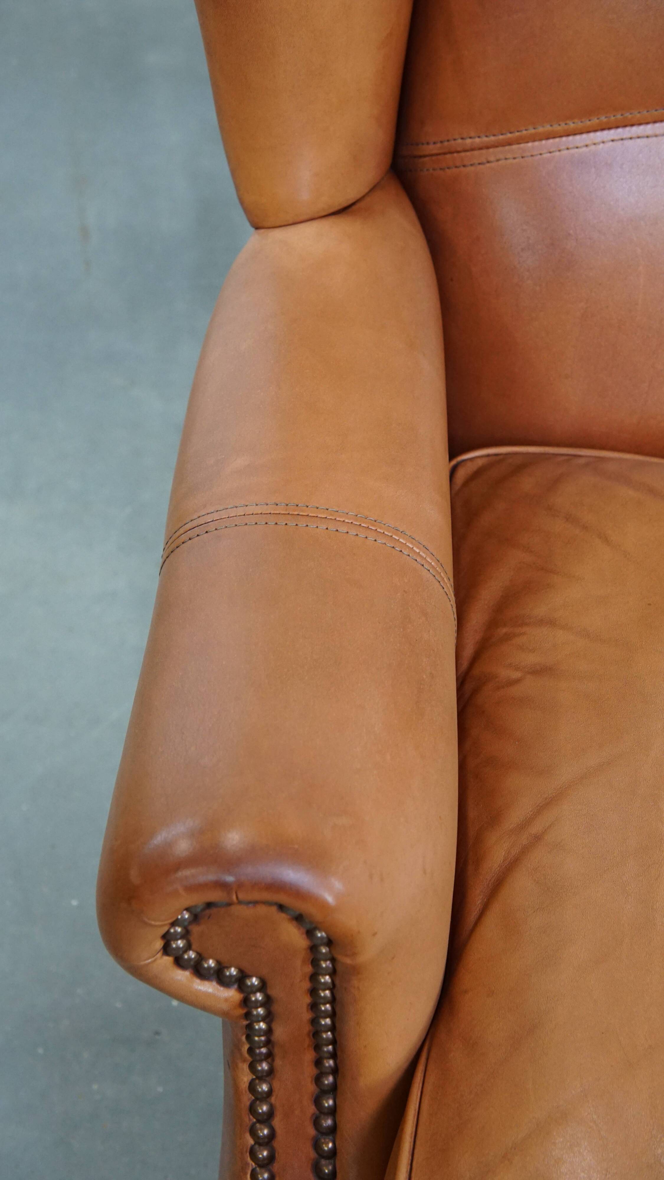 Set of 2 leather wingback chairs