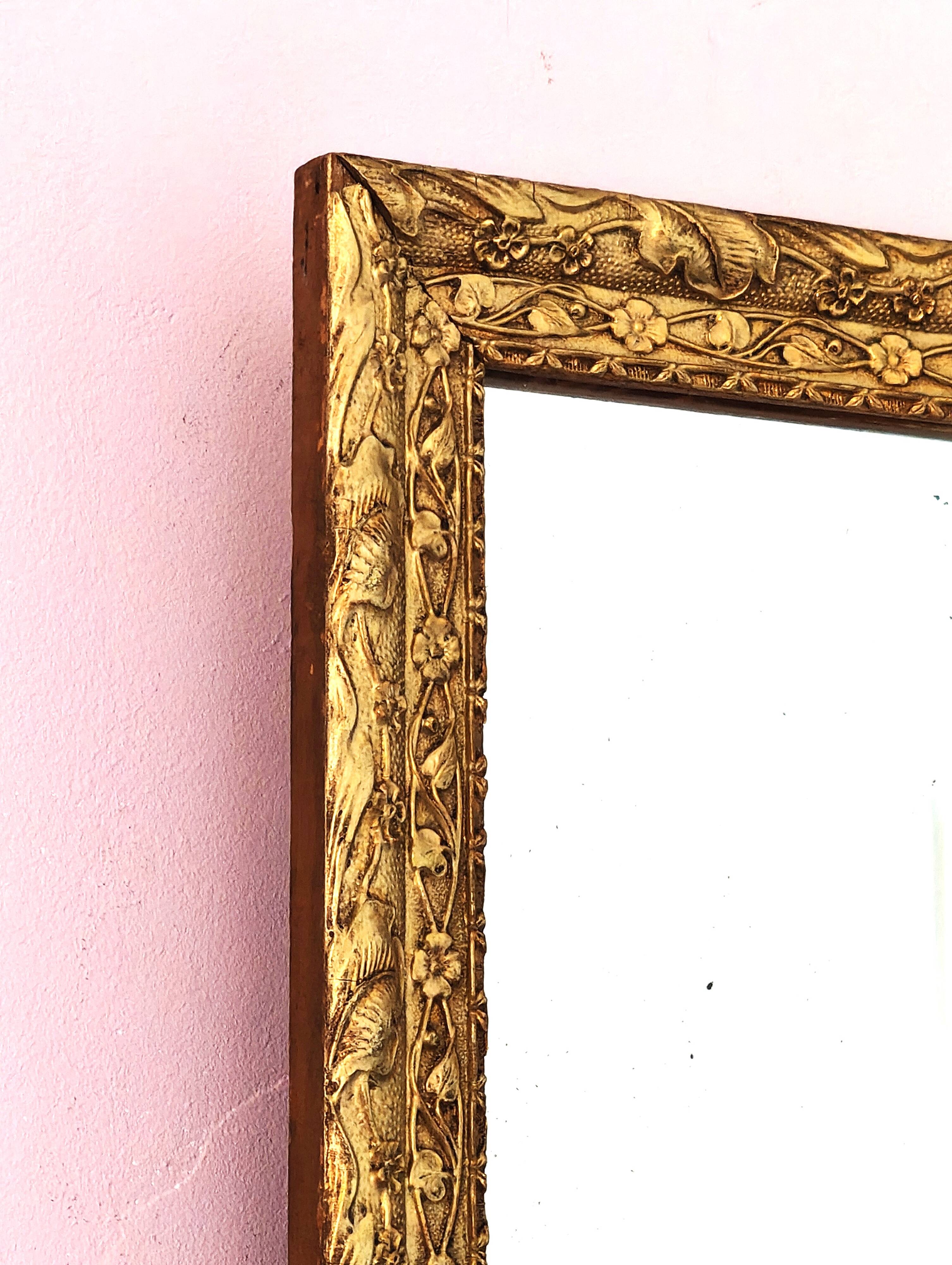 Miroir rectangulaire Art déco, cadre doré et travaillé