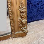 Empire period mirror in wood and gilded stucco circa 1810-1820