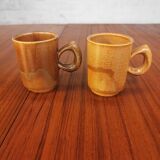 Duo of vintage stoneware cups