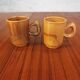 Duo of vintage stoneware cups