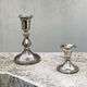 Two antique candle holders